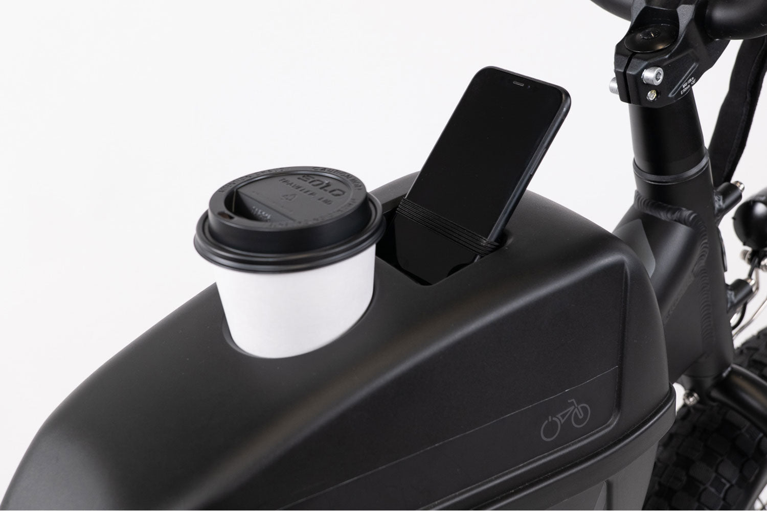 storage unit on bike with phone and coffee